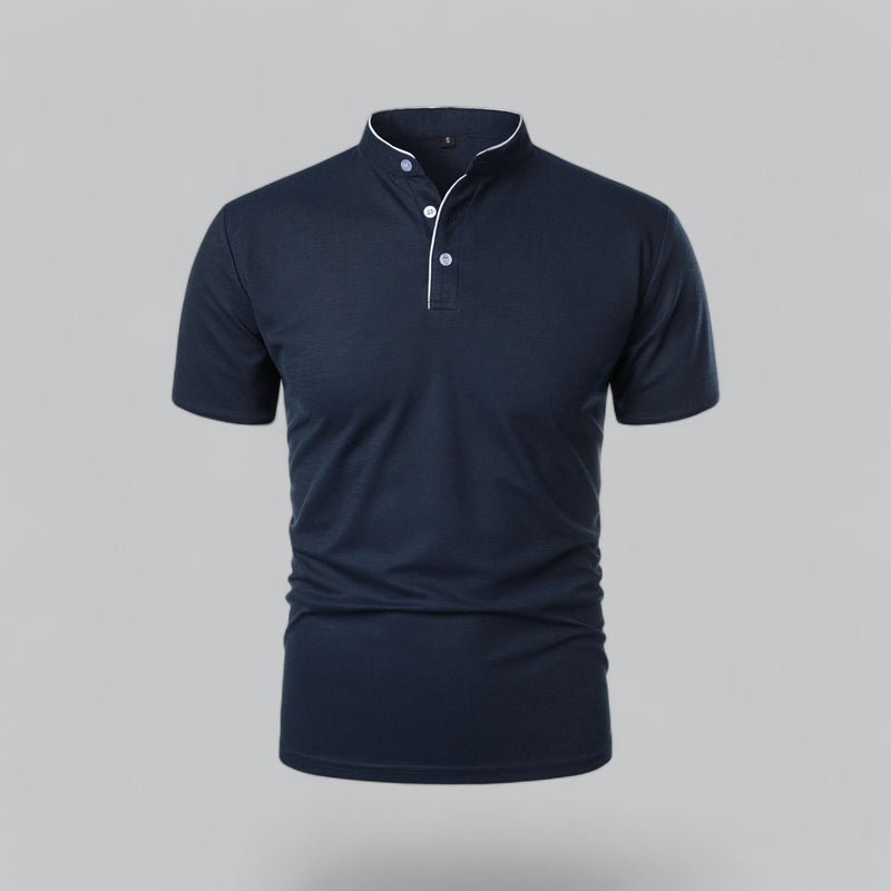 Navy blue polo shirt on a gray background