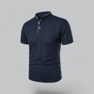 Navy blue polo shirt on a gray background
