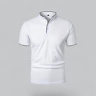 White polo shirt with a black zipper on a gray background