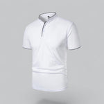 White polo shirt with black trim on a gray background