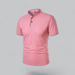 Pink polo shirt on a gray background