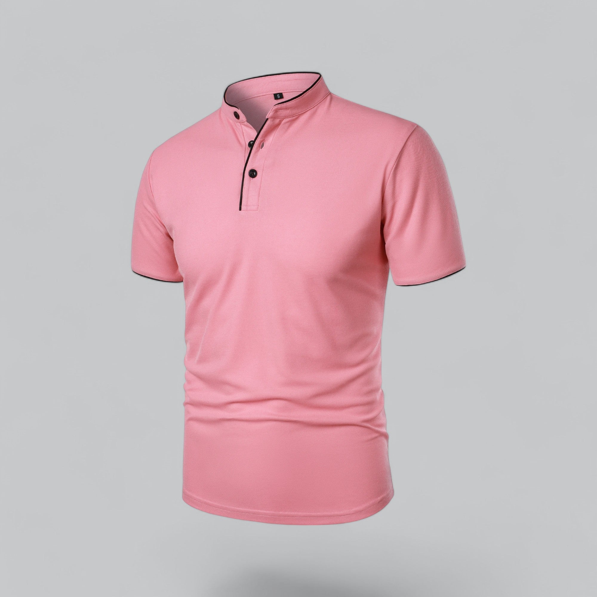 Pink polo shirt on a gray background