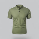 Green polo shirt on a gray background