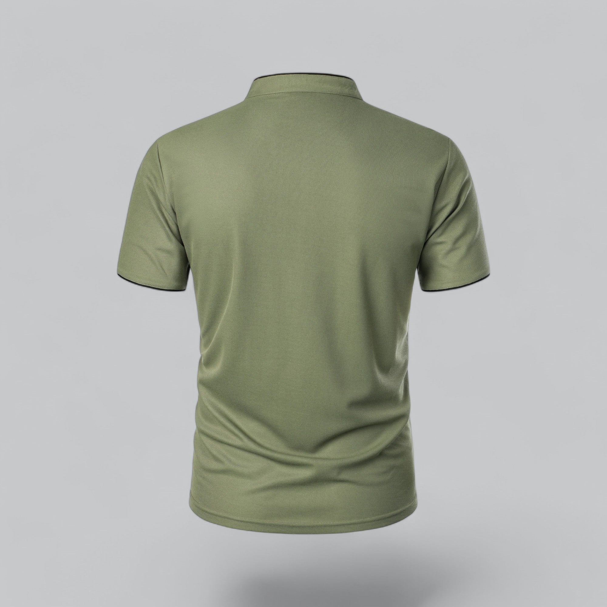 Green polo shirt on a gray background