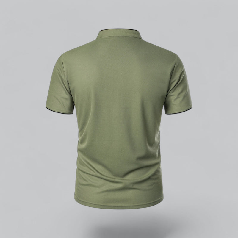 Green polo shirt on a gray background