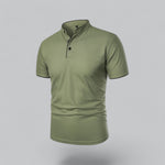 Green polo shirt on a gray background