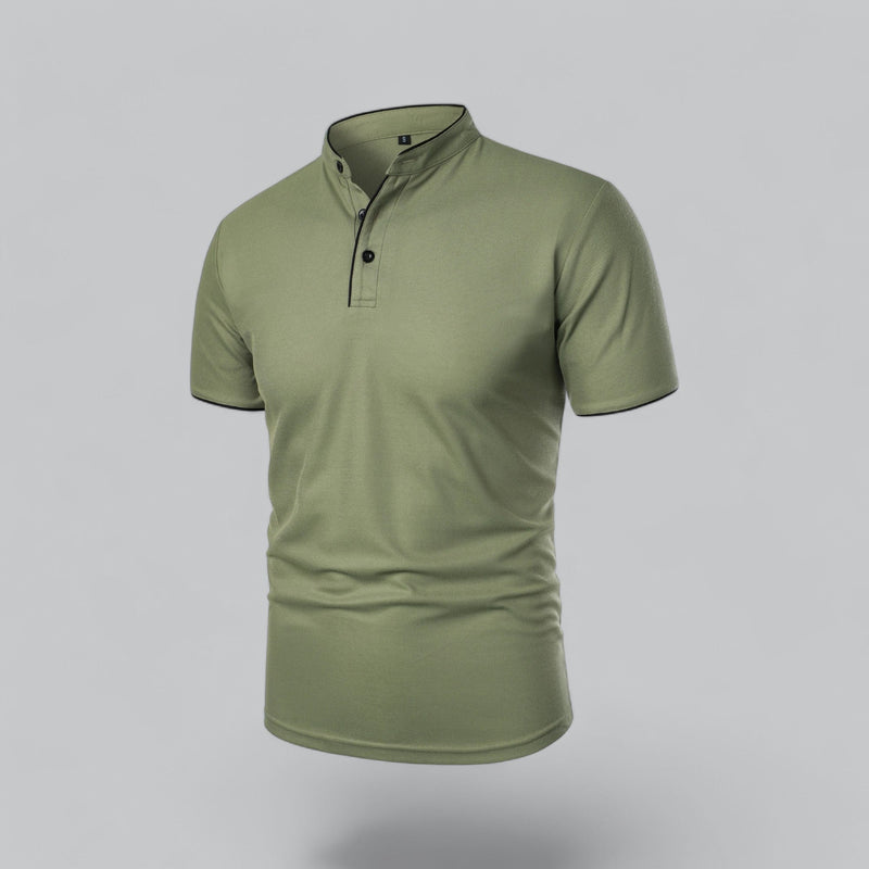 Green polo shirt on a gray background