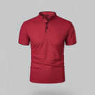 Red short-sleeve shirt with black buttons on a gray background