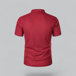 Red polo shirt on a gray background
