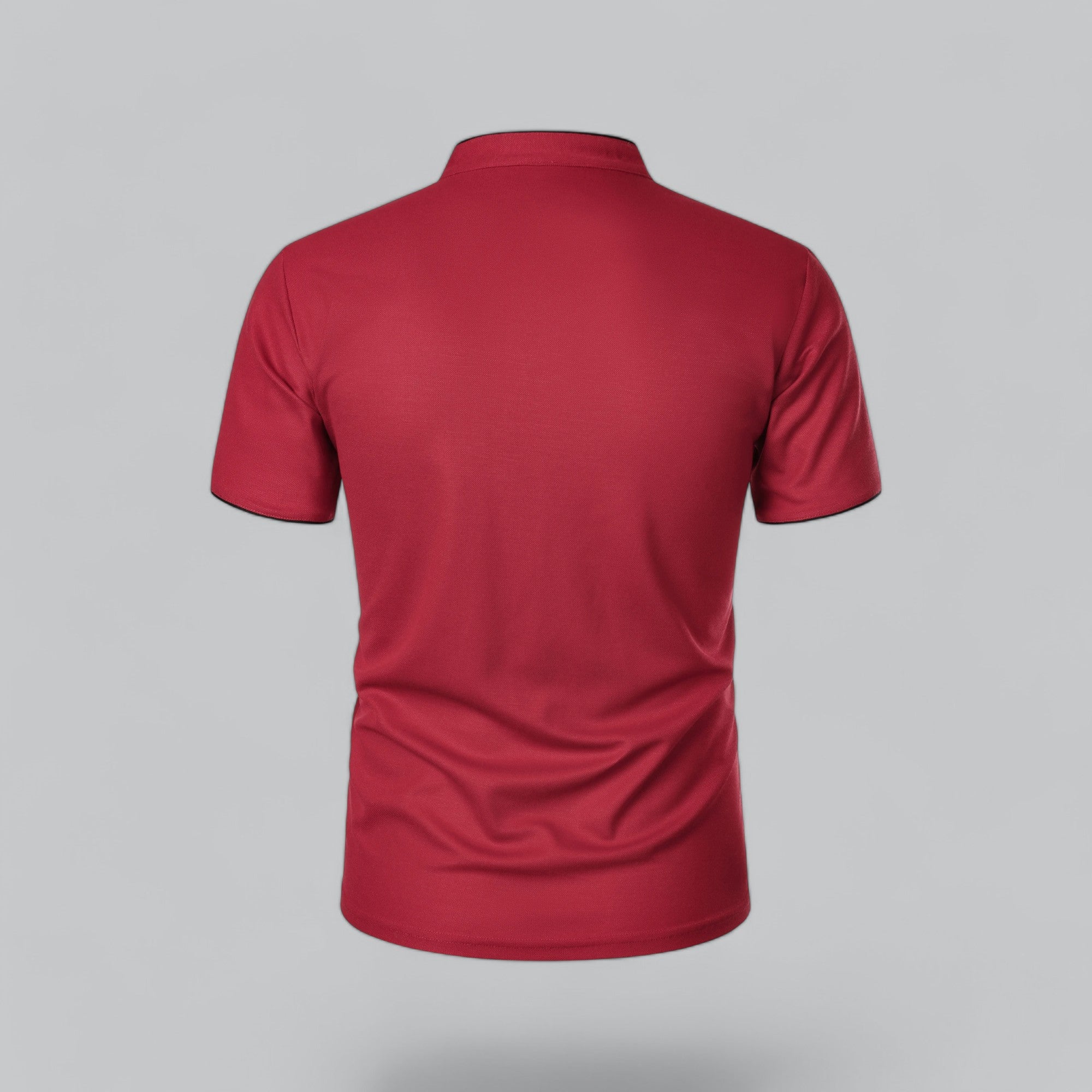 Red polo shirt on a gray background