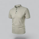 Beige polo shirt on a light gray background