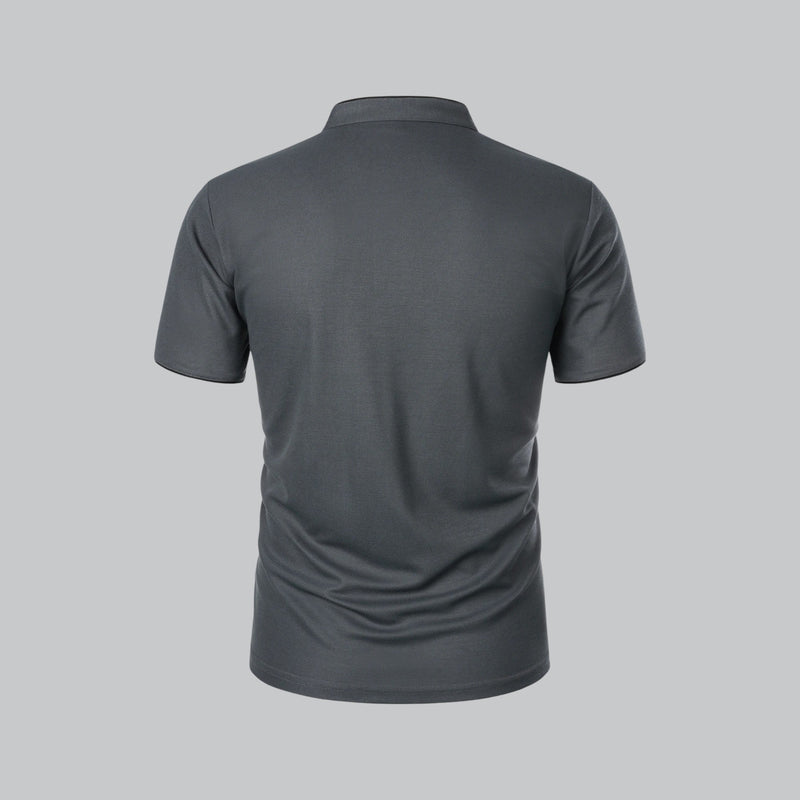 Gray polo shirt on a gray background
