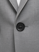 Close-up of a gray suit jacket with a button