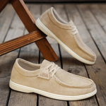 Beige casual shoes on a wooden floor