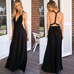Black evening gown displayed from front and back views on a wooden deck.