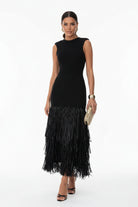 Raffia knit midi dress with tassel detailing and stretch fit silhouette