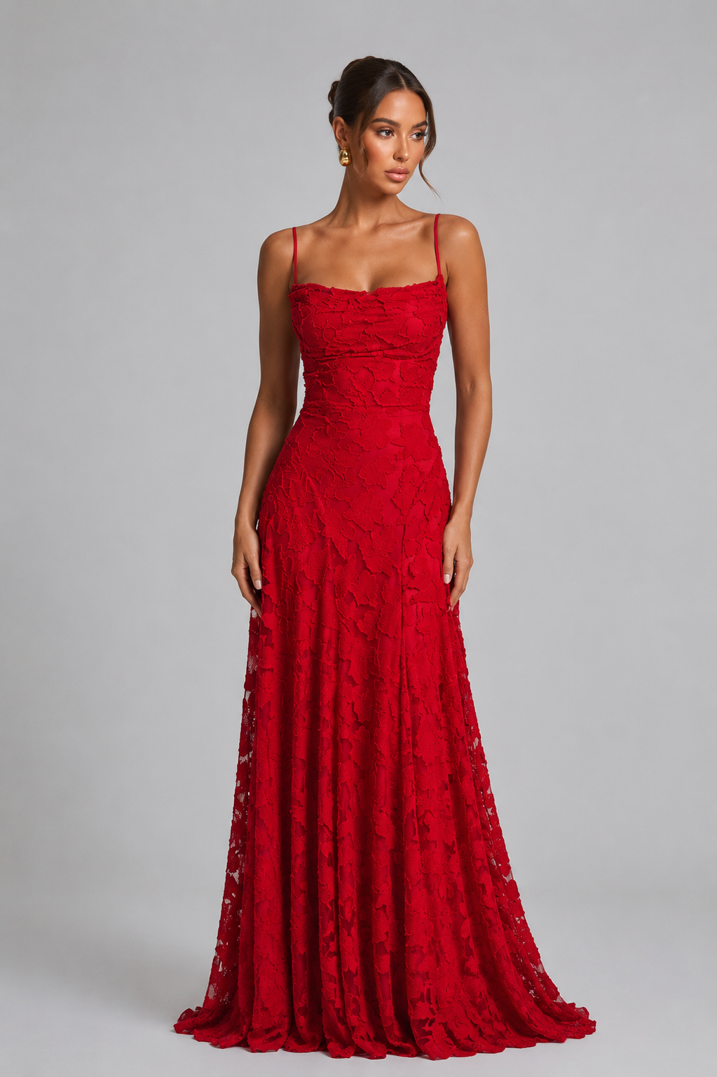 Red lace evening gown on a model against a gray background