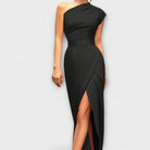 Black one-shoulder dress with a slit on a gray background