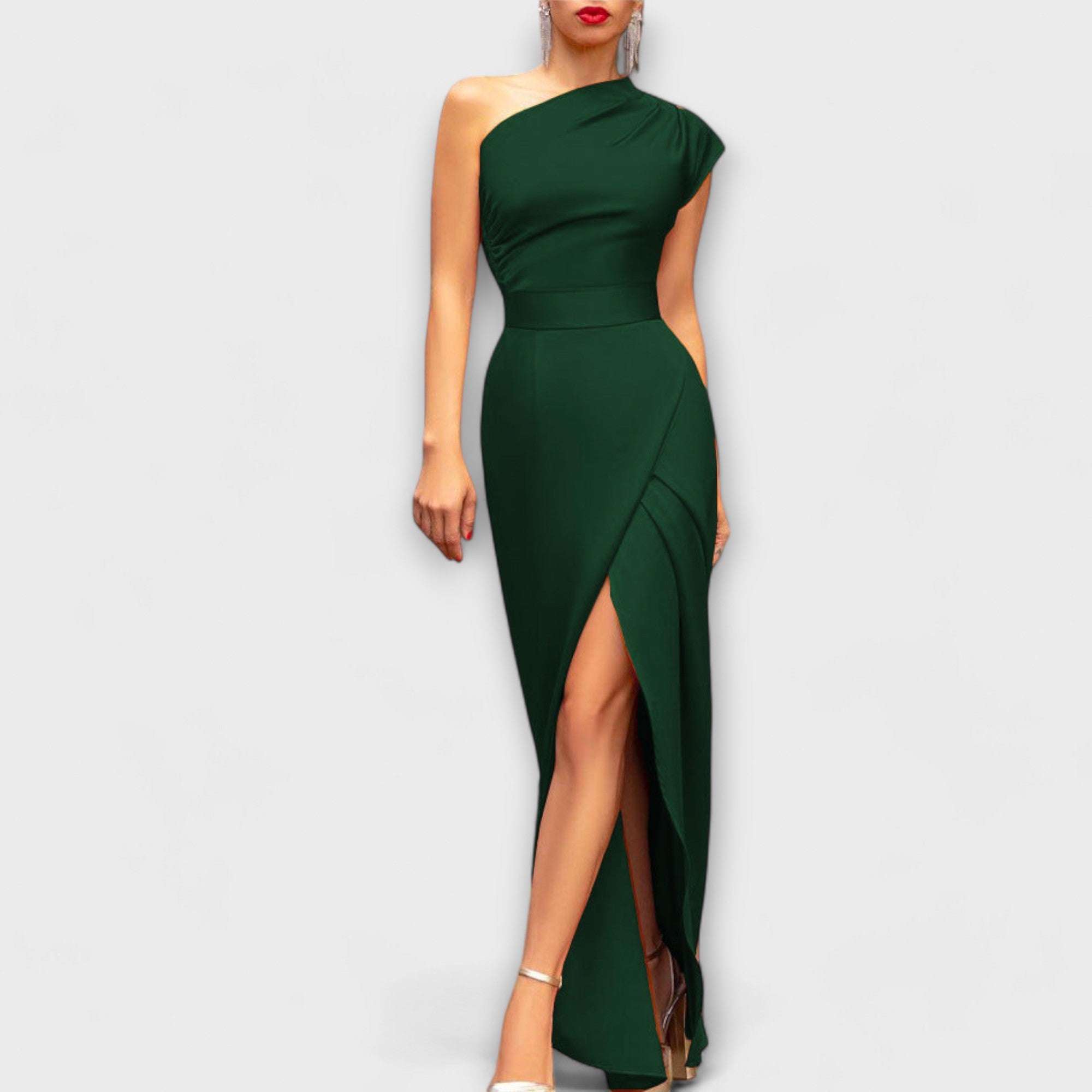 Green one-shoulder dress with a slit on a white background