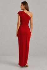 Red one-shoulder evening gown on a gray background