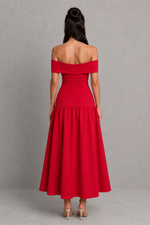 Red off-shoulder dress on a gray background