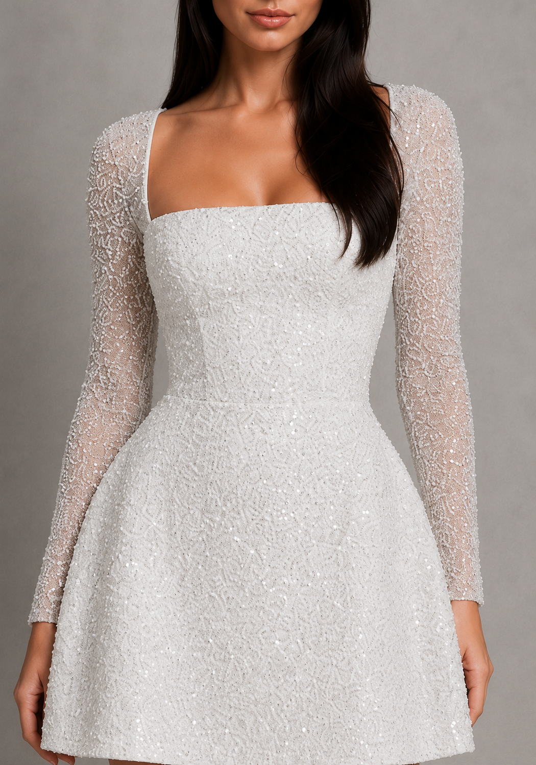 White dress with long sleeves on a gray background