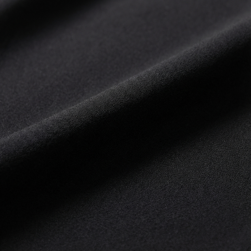 Close-up of black fabric with a textured surface