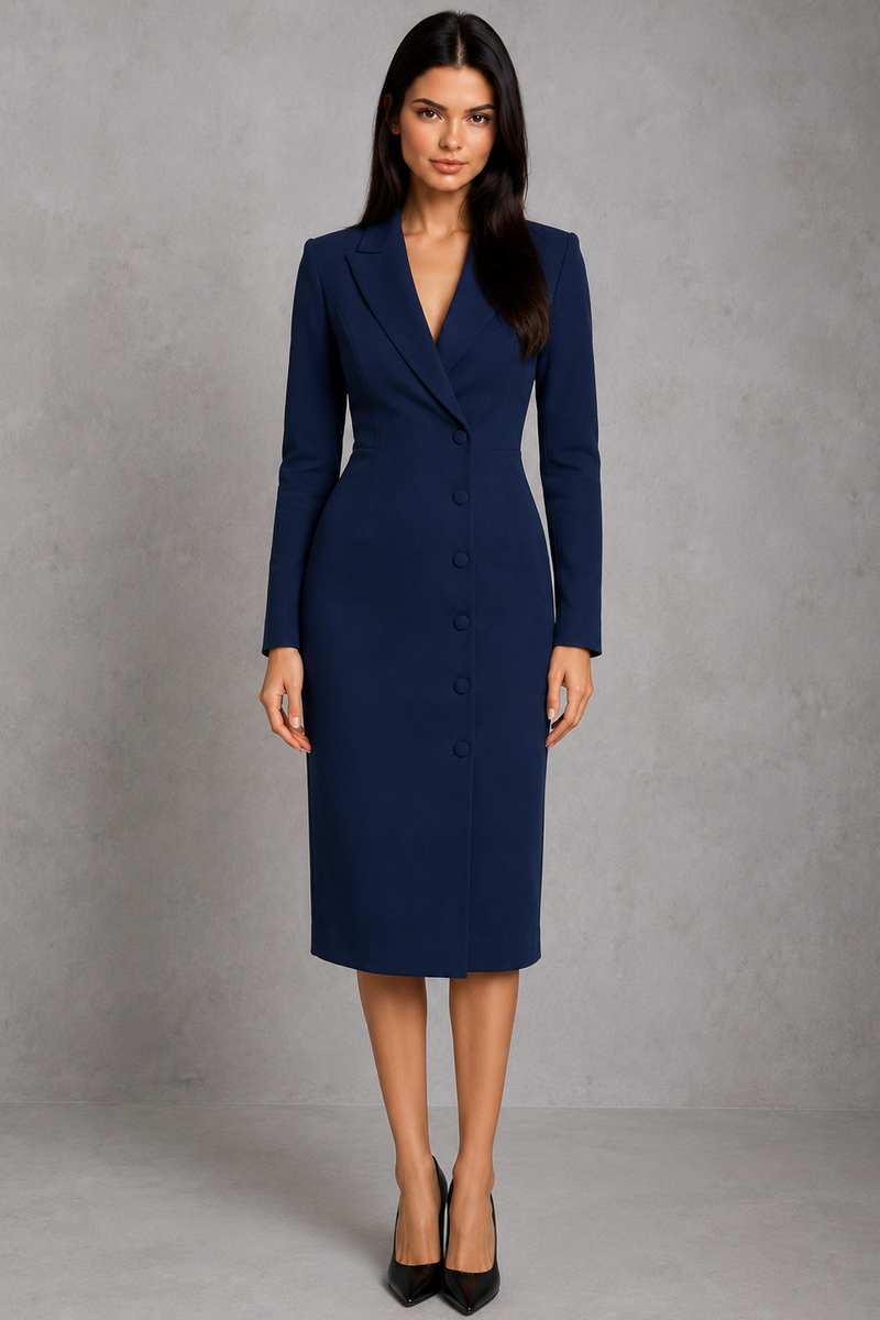Woman wearing a navy blue suit dress against a gray background