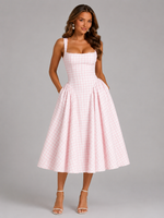 Women’s blush gingham midi dress with square neckline, fitted bodice, and flowing full skirt