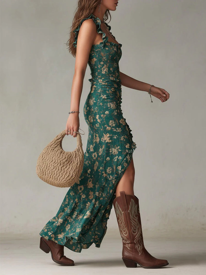Woman wearing a green floral dress with brown cowboy boots and a woven bag.
