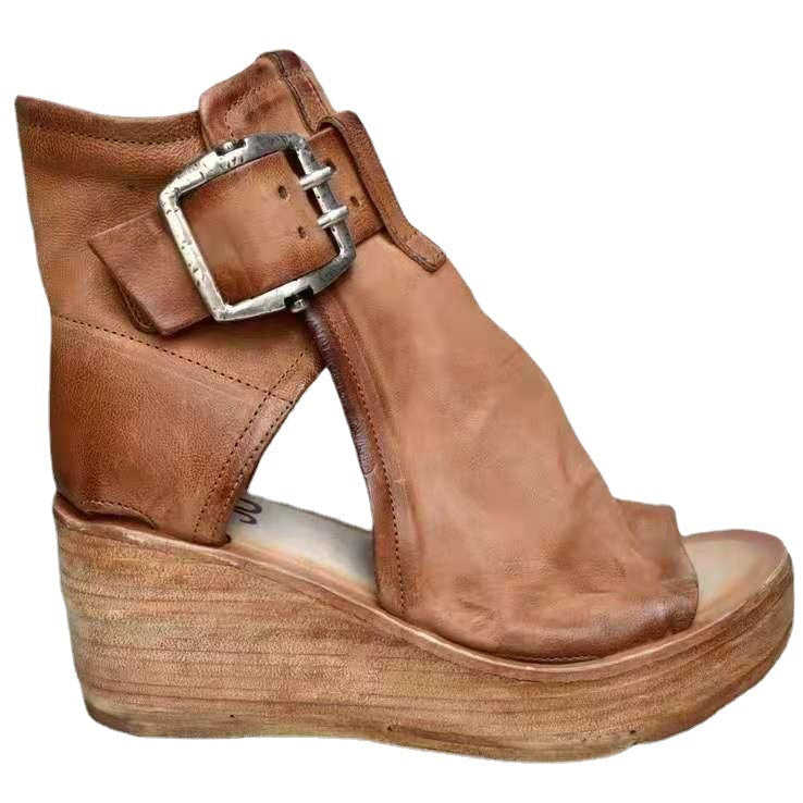 Brown wedge sandal with a buckle on a white background