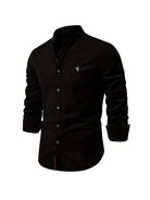 Black button-up shirt on a white background