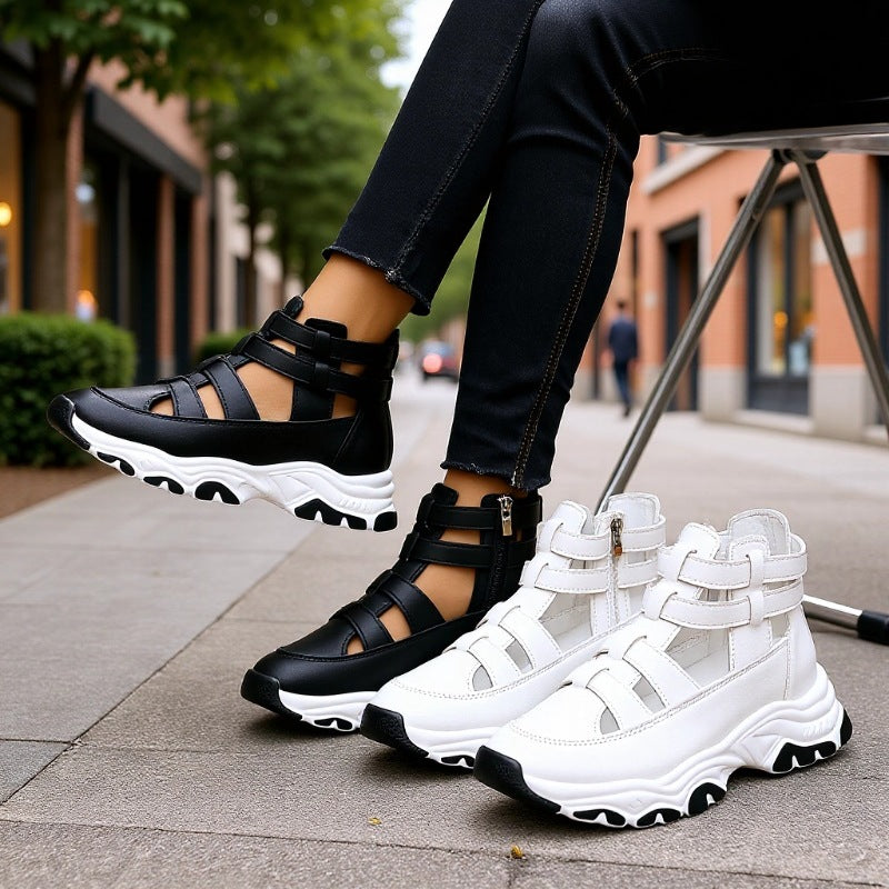 Black and white sneakers on a person's feet with a blurred urban background