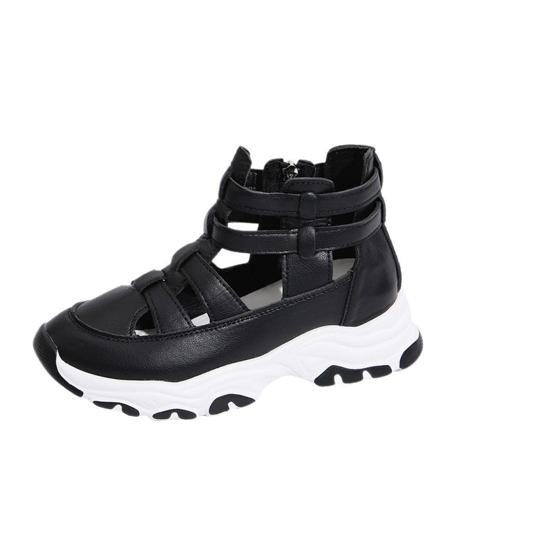 Black sandal with white sole on a white background