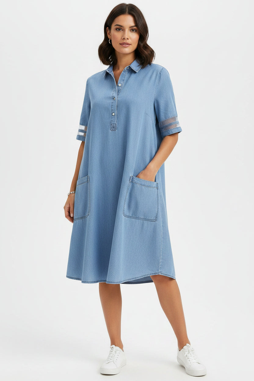 Light blue denim dress with short sleeves on a white background