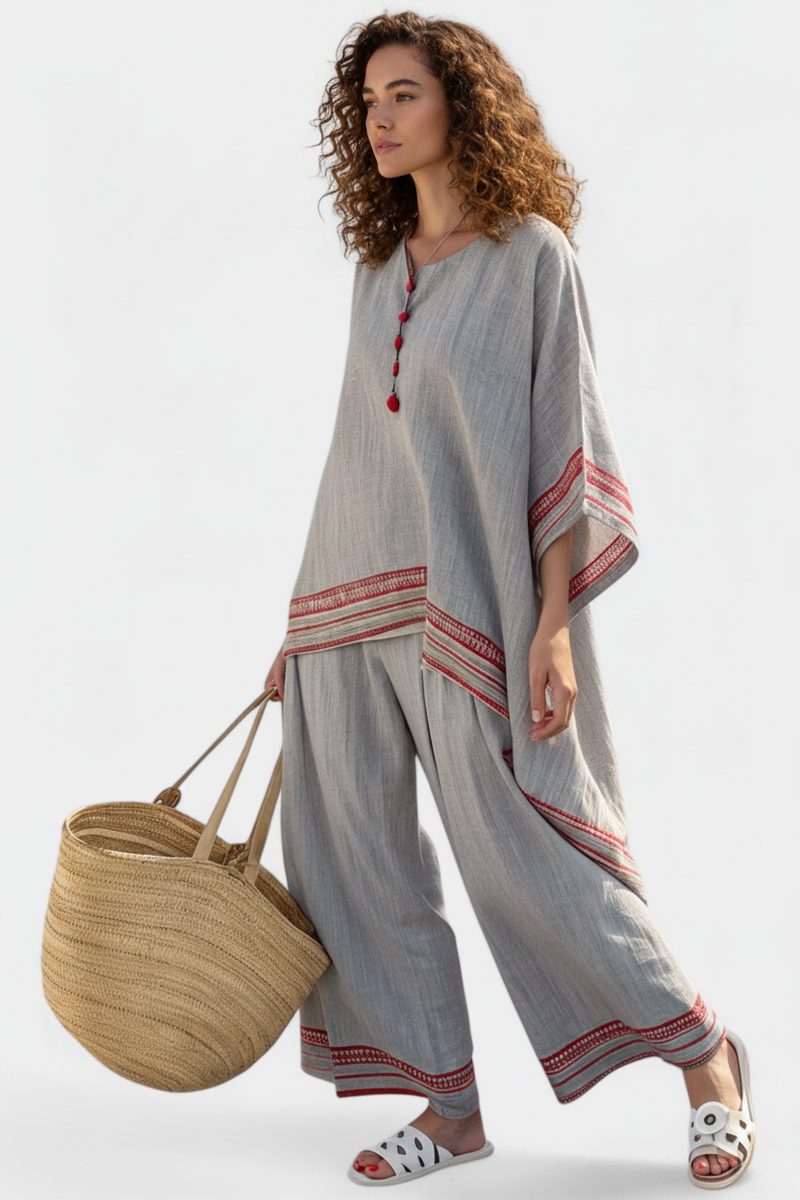 Women’s embroidered blouse with asymmetrical design and wide leg pants set