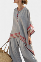 Women’s embroidered blouse with asymmetrical design and wide leg pants set