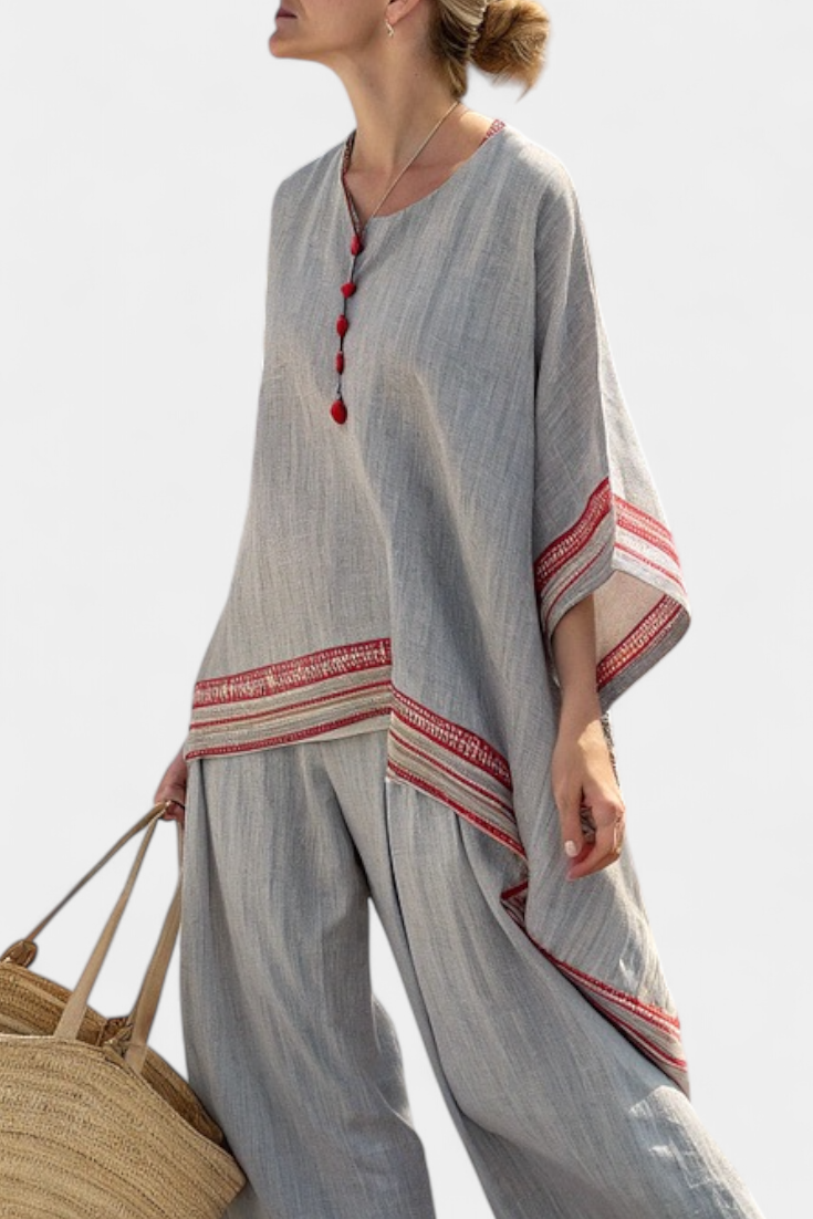 Women’s embroidered blouse with asymmetrical design and wide leg pants set