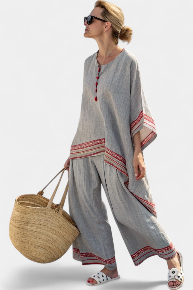 Women’s embroidered blouse with asymmetrical design and wide leg pants set