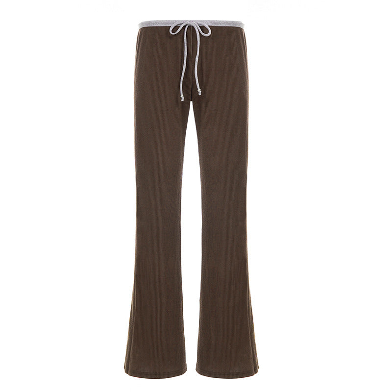 Brown sweatpants with a white drawstring on a white background