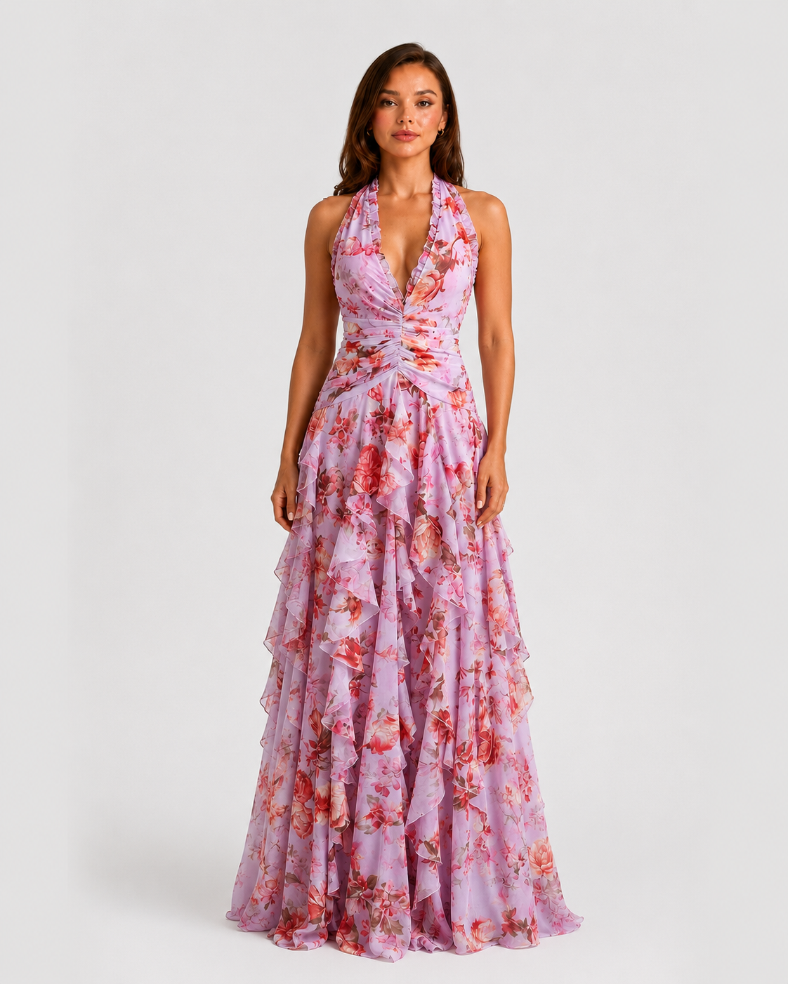Woman wearing a floral dress on a white background