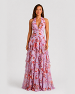 Woman wearing a floral dress on a white background