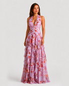 Woman wearing a floral dress on a white background