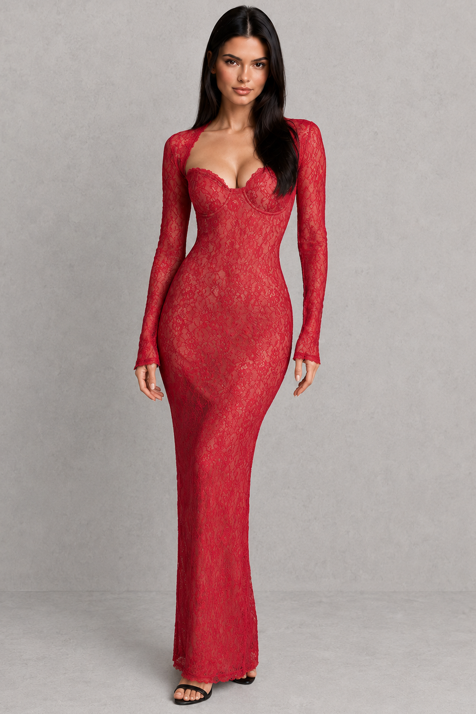 Woman wearing a red lace dress against a gray background