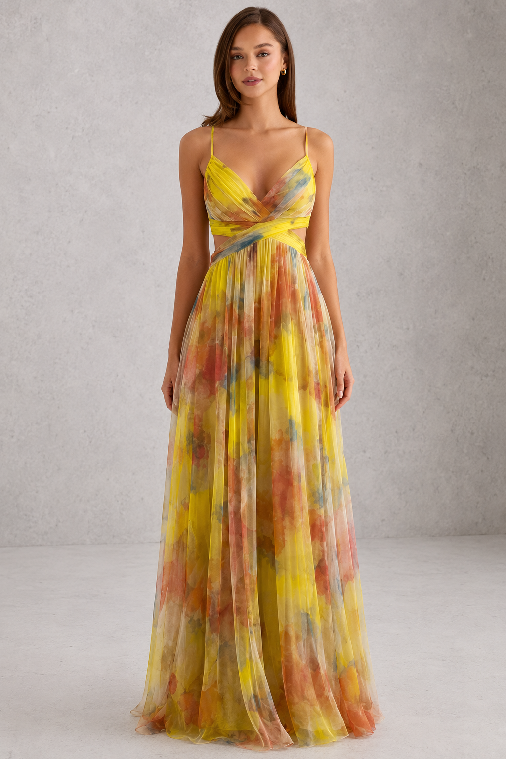 Woman wearing a colorful dress against a neutral background