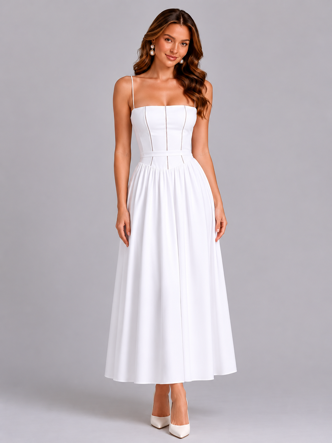 Woman wearing a white dress on a gray background