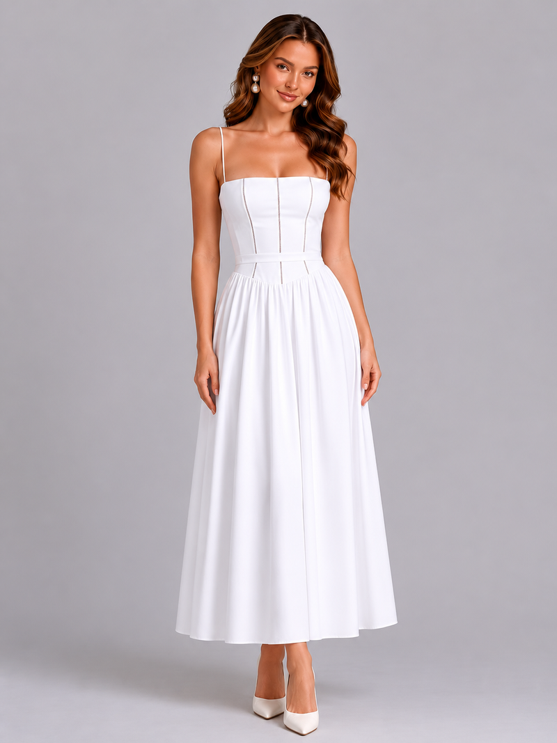 Woman wearing a white dress on a gray background