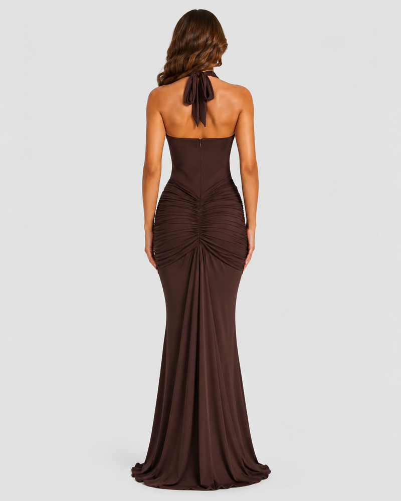 Brown evening gown with a draped design on a white background