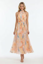 Women’s halter neck maxi dress with watercolor print and open back