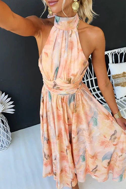 Women’s halter neck maxi dress with watercolor print and open back